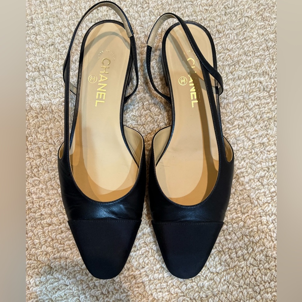 Black Chanel flats worn one time